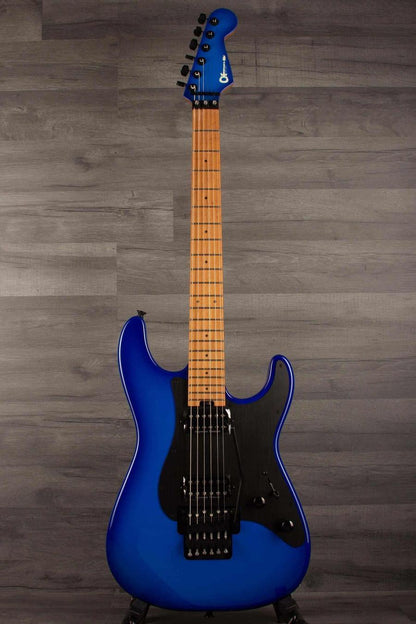 Charvel - PRO-MOD Plus So-cal style 1 HH Floyd rose - Blueburst electric guitar on display against a wooden backdrop.
