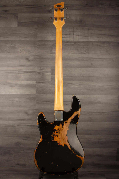Duesenberg Chris Chaney Bass Black Distressed LTD back view showcasing its unique distressed design.