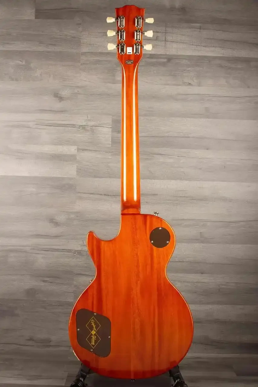 Back view of Epiphone 1957 Les Paul Goldtop Reissue showcasing its solid mahogany body and classic design.