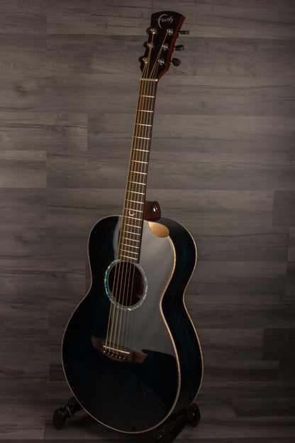 Faith BLUE MOON Series Mercury E Scoop Inc Case displayed on a stand, showcasing its unique blue wood finish.