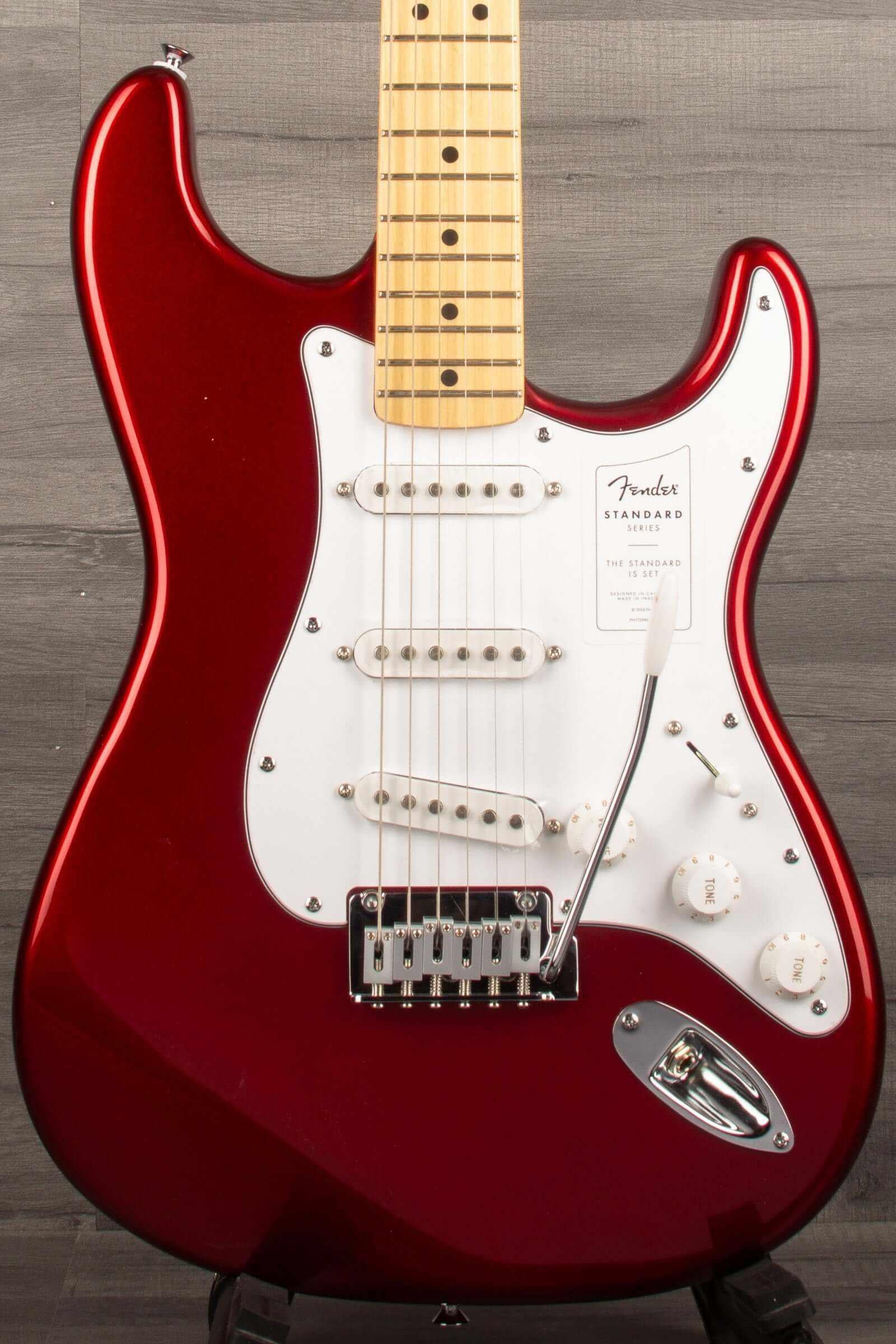 Fender Standard Stratocaster®, Maple Fingerboard, White Pickguard, Candy Cola