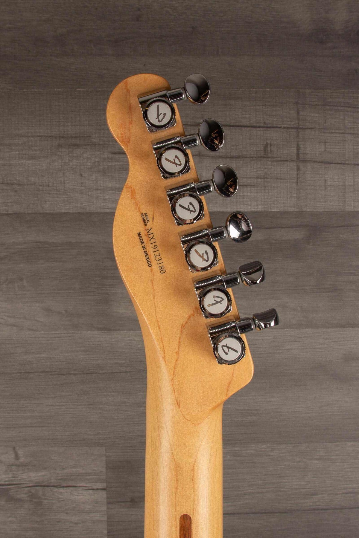 USED - Fender Deluxe Telecaster Thinline, Maple Fingerboard, Candy Apple Red headstock image showing tuning pegs.