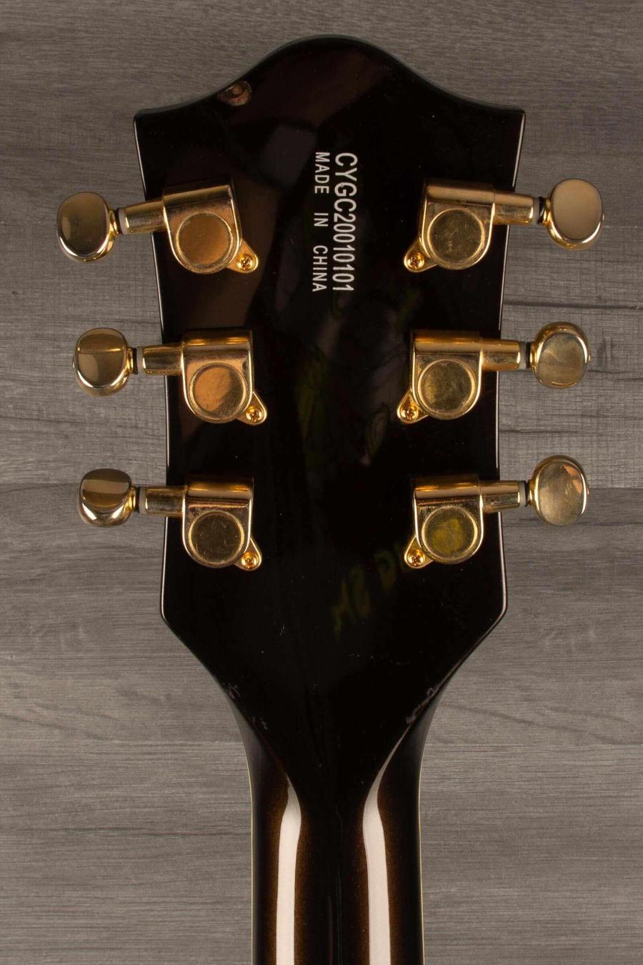 Back of a used Gretsch G5655TG Electromatic Center Block Jr. guitar headstock showing tuning pegs and model details.