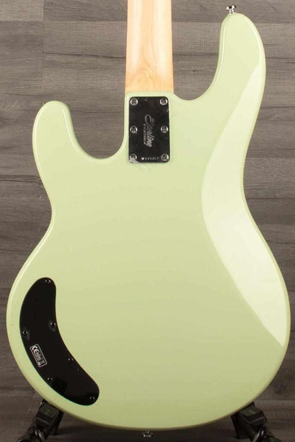 Sterling Stingray Intro series  Bass Guitar - Misty Green back view showcasing its iconic design and finish.