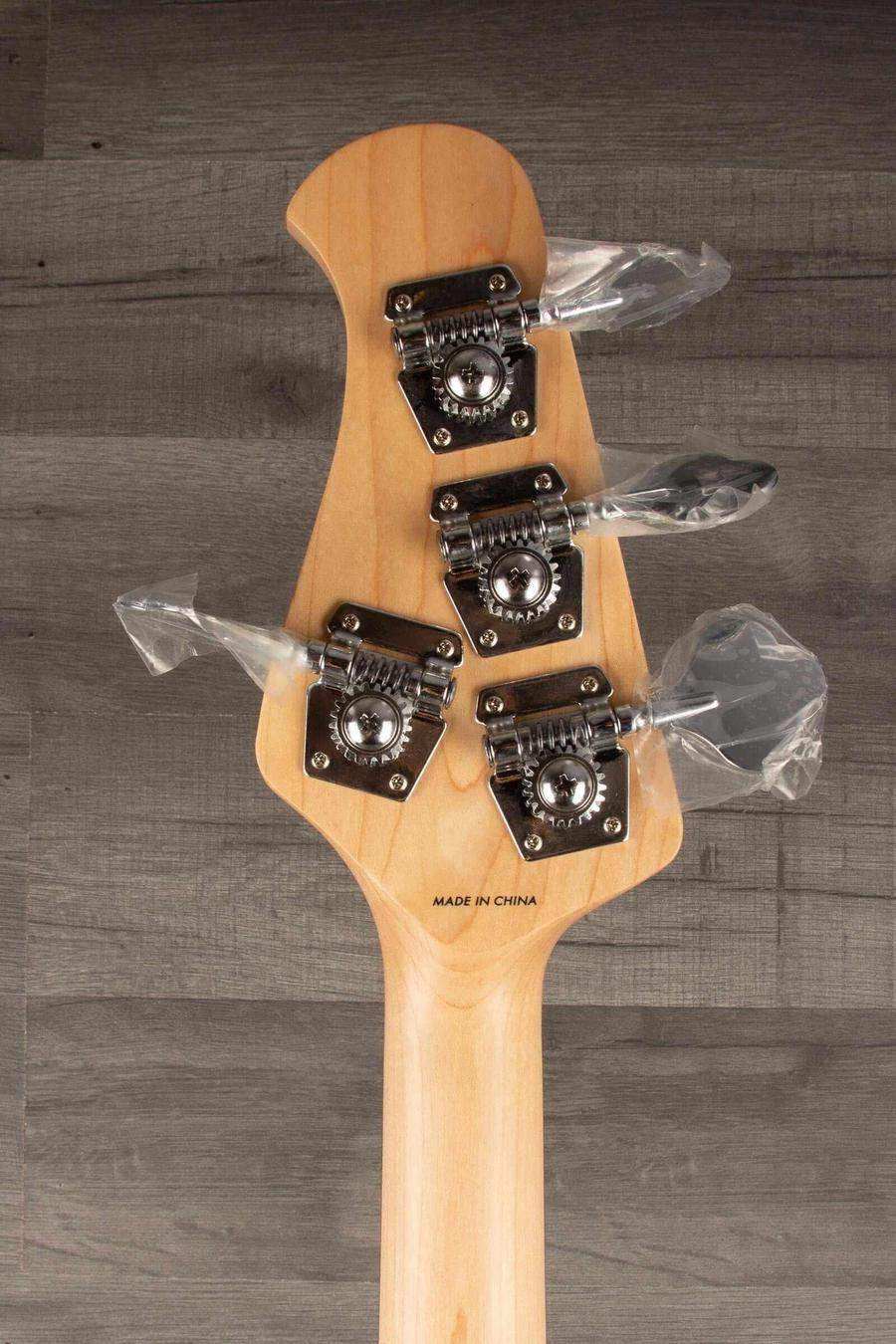 Sterling Stingray Intro series Bass Guitar - Misty Green headstock with tuning pegs and protective coverings.