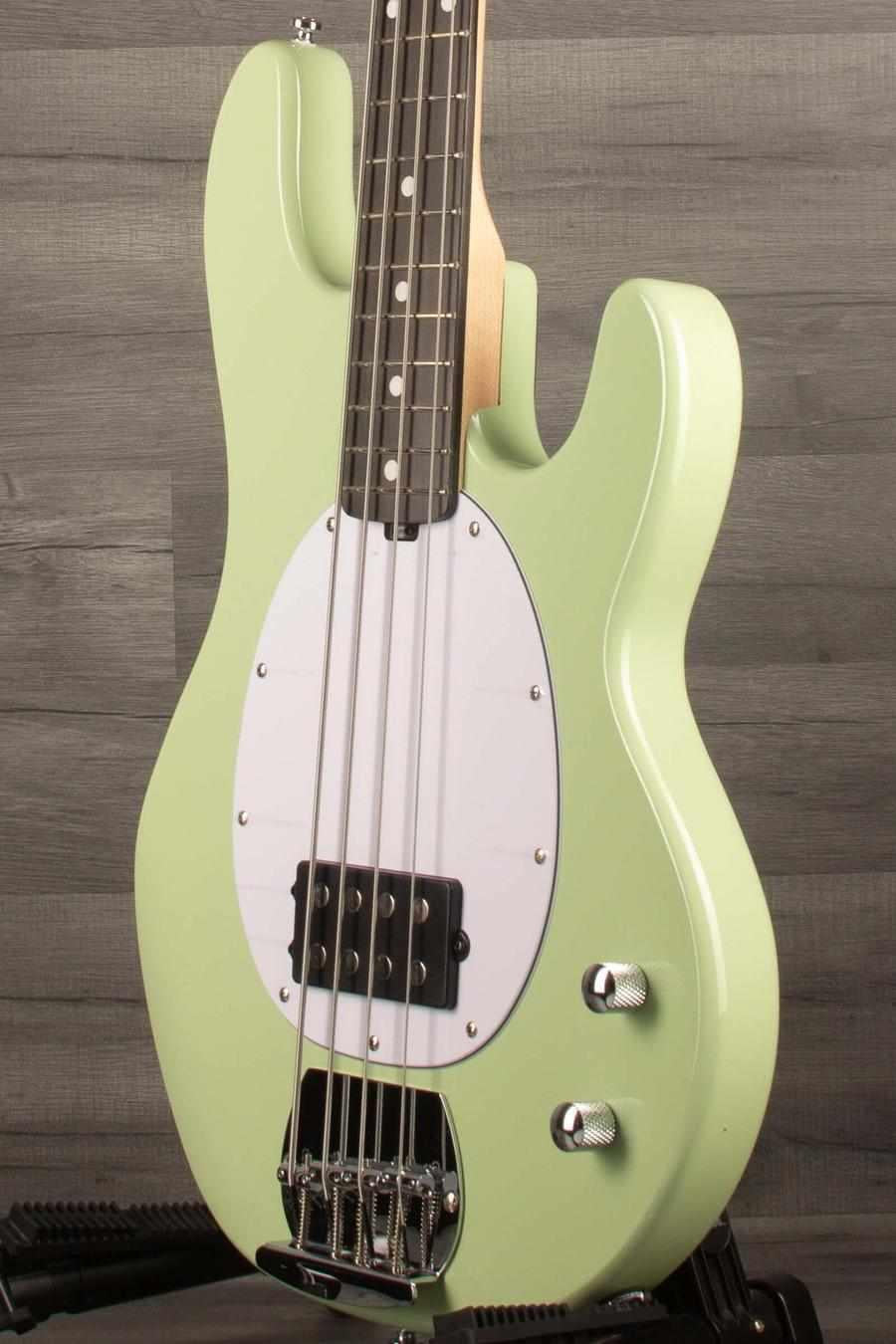 Sterling Stingray Intro series  Bass Guitar - Misty Green showcasing its iconic design and ergonomic features.
