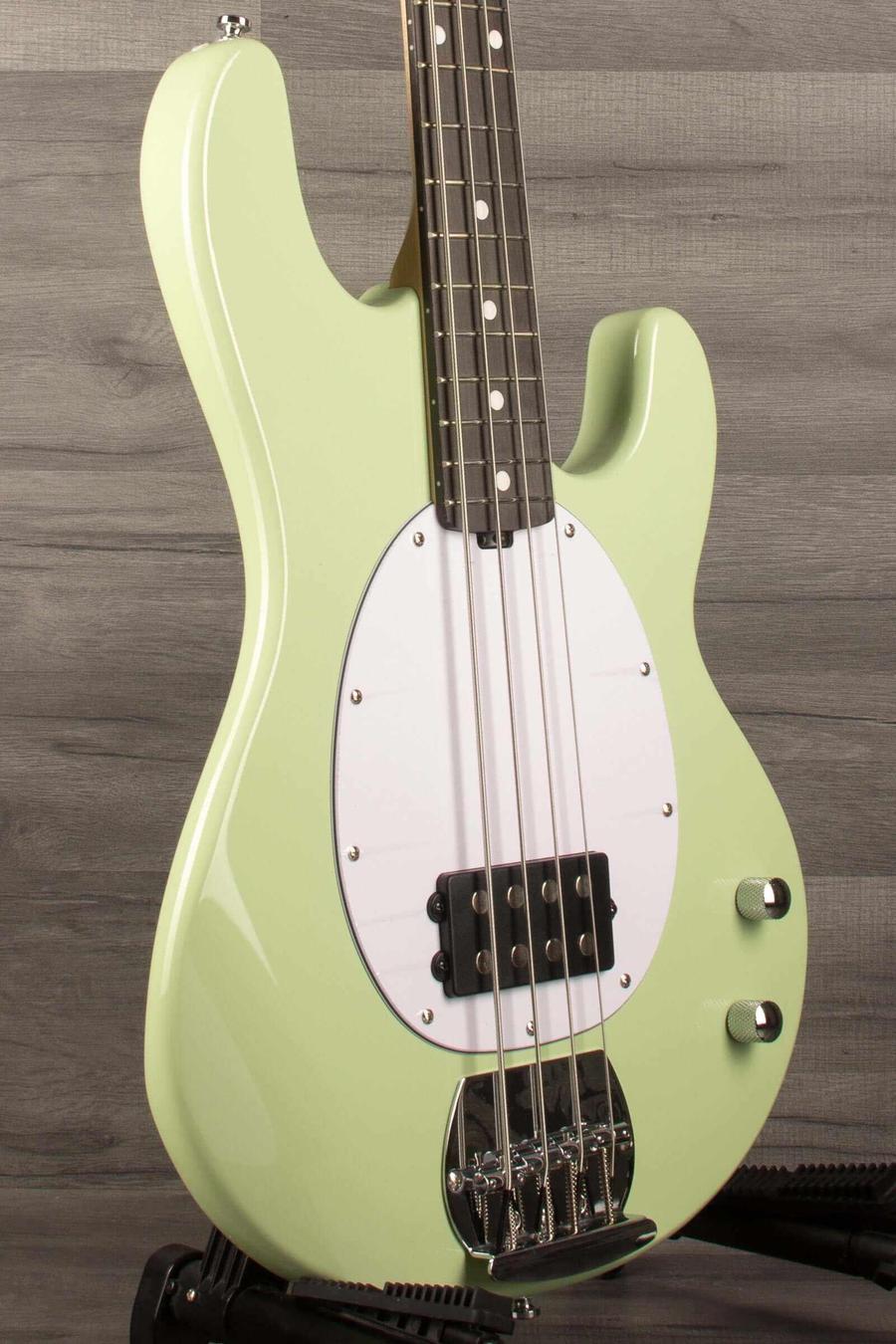 Sterling Stingray Intro series  Bass Guitar - Misty Green showcasing its iconic design and ergonomic features.