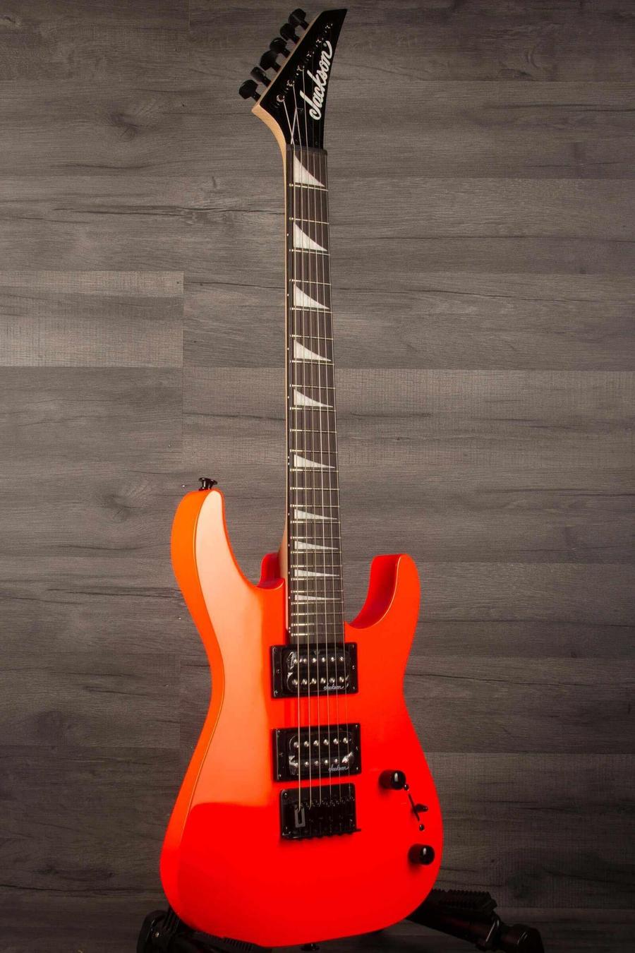 Jackson  JS Series Dinky® Minion JS1X, Amaranth Fingerboard, Safety Orange guitar with sleek design.