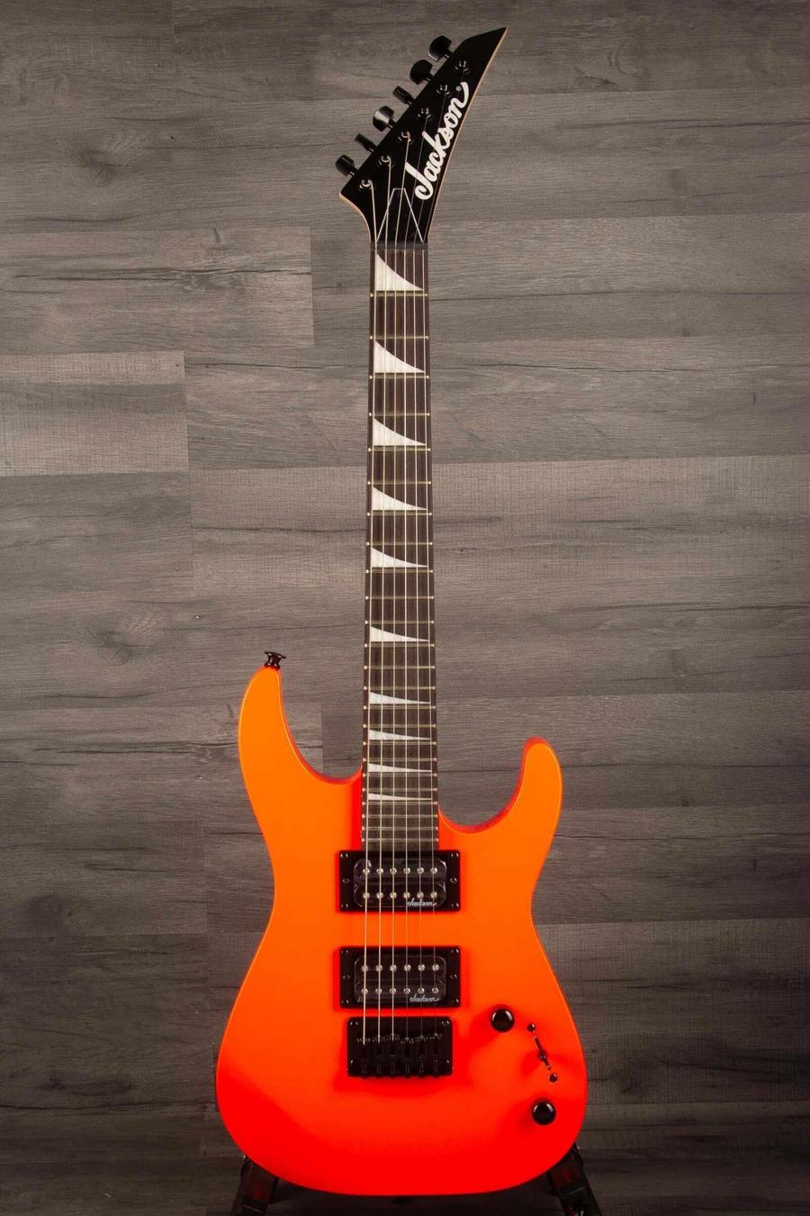Jackson  JS Series Dinky® Minion JS1X, Amaranth Fingerboard, Safety Orange electric guitar with black hardware.