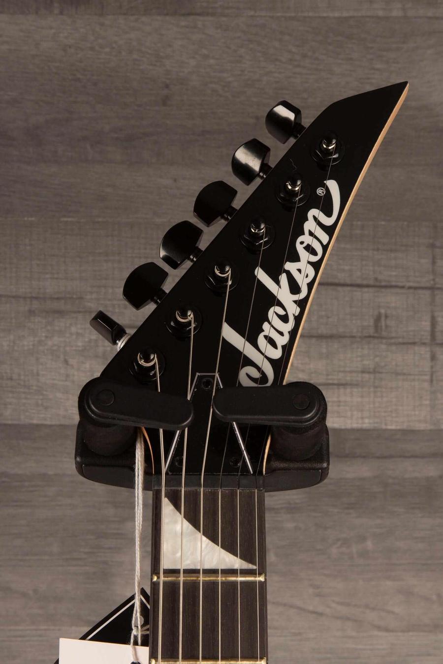 Jackson JS Series RR JS1XM Minion Electric Guitar - Snow White with black hardware and Jackson pointed 6-in-line headstock.
