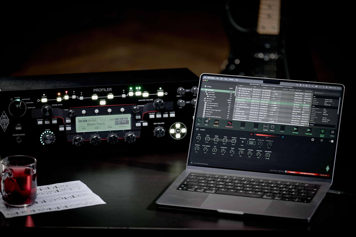 Kemper PROFILER™ Powered Rack Guitar Amp MKII next to a laptop with audio software, showcasing modern multi-FX features.