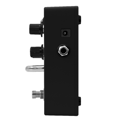 Orange King Comp side view showing knobs and input/output connections for guitar and bass.