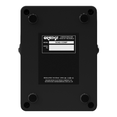 Orange King Comp pedal bottom view showing model and serial details.