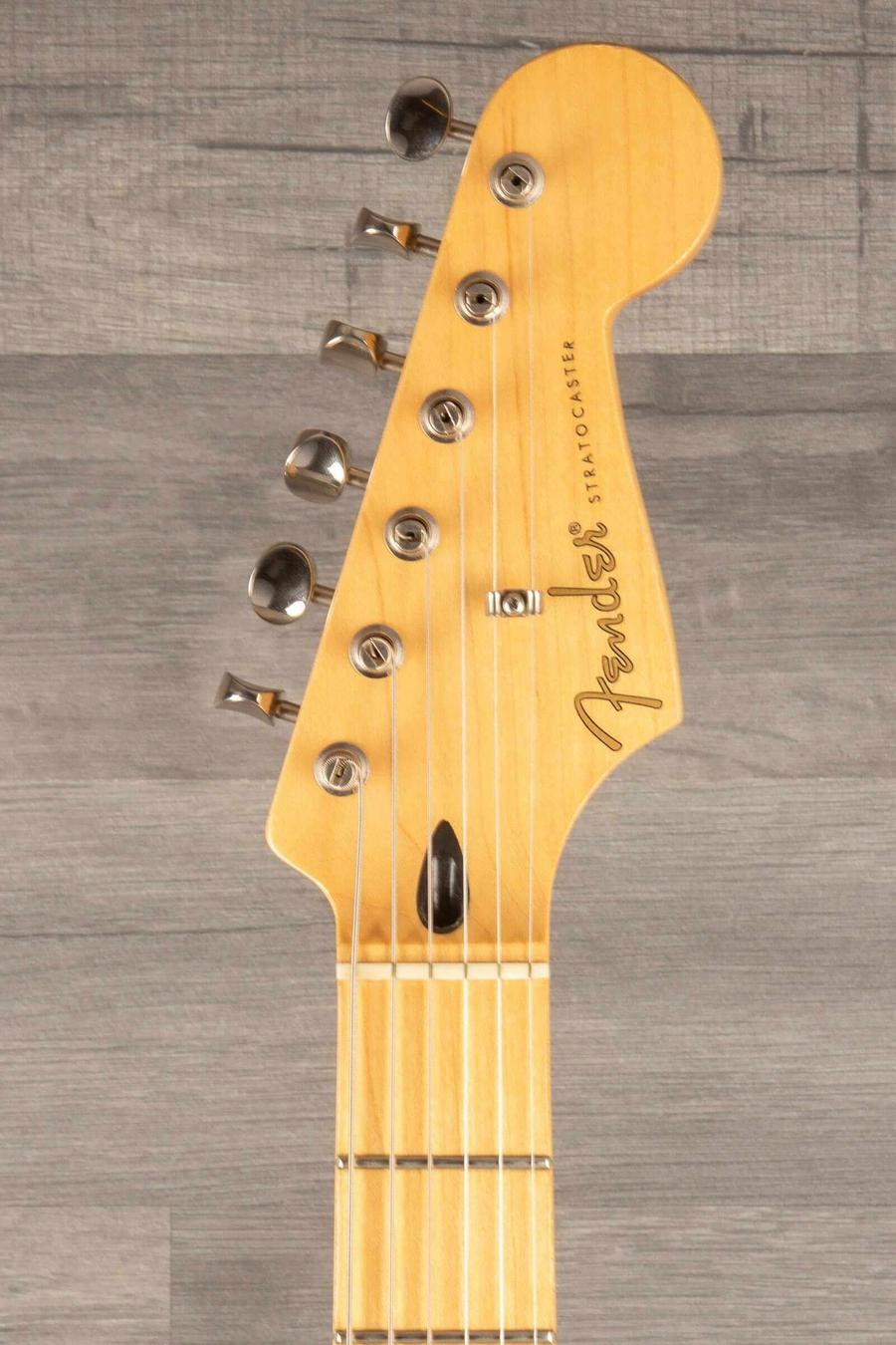 USED - Road Worn Partscaster Stratocaster Black guitar headstock with six tuning pegs and Fender logo.