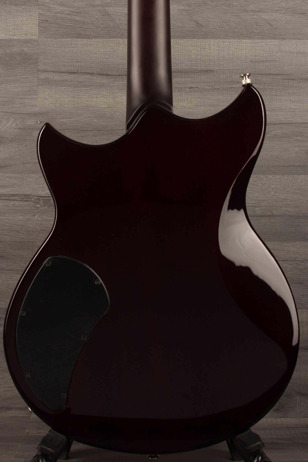Yamaha RSS02T Revstar - Fire Red guitar back view showcasing the unique body design and glossy finish.