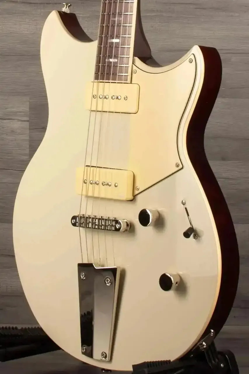 Yamaha RSS02T Revstar - Vintage White guitar showcasing custom tailpiece and P90 pickups.