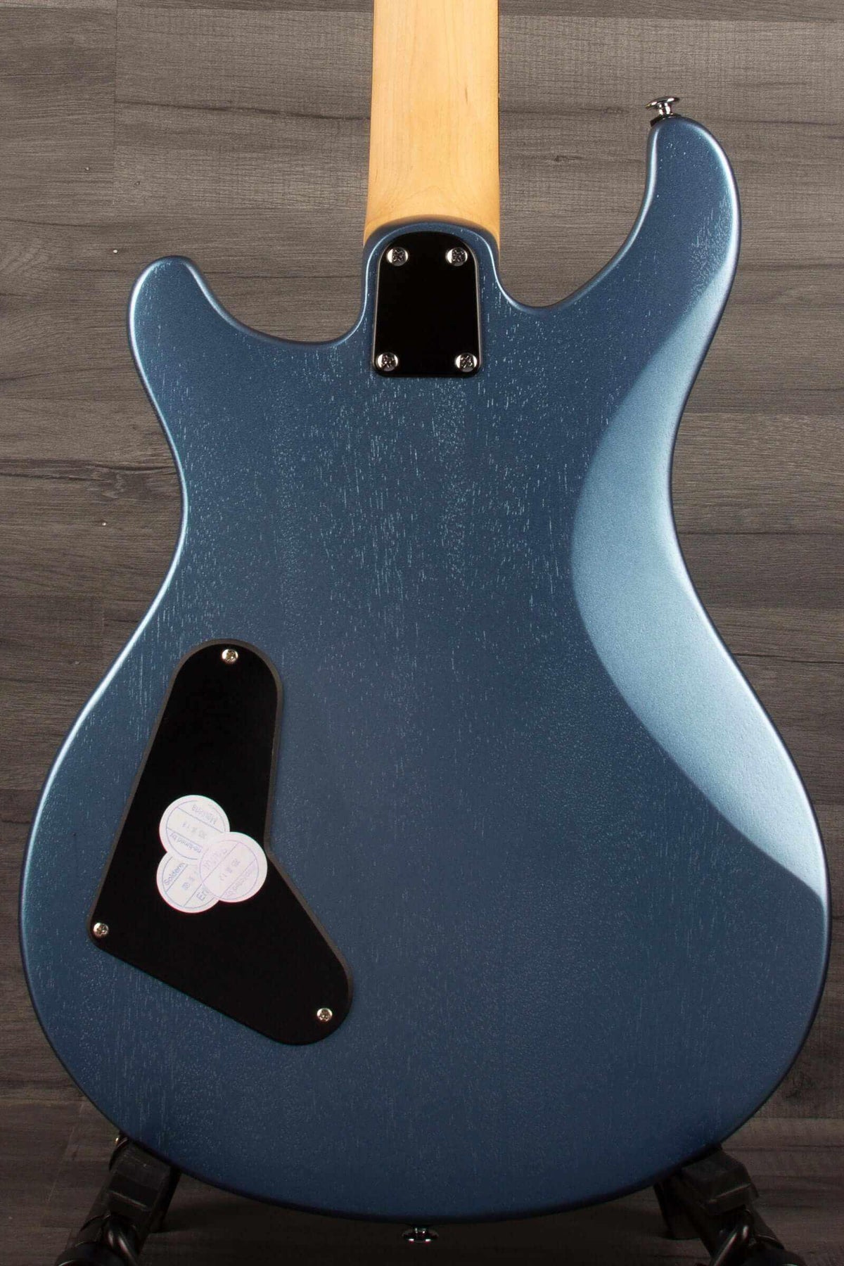 PRS SE CE24 Standard Stoptail in ice blue metallic finish showcasing the back design and body contours.