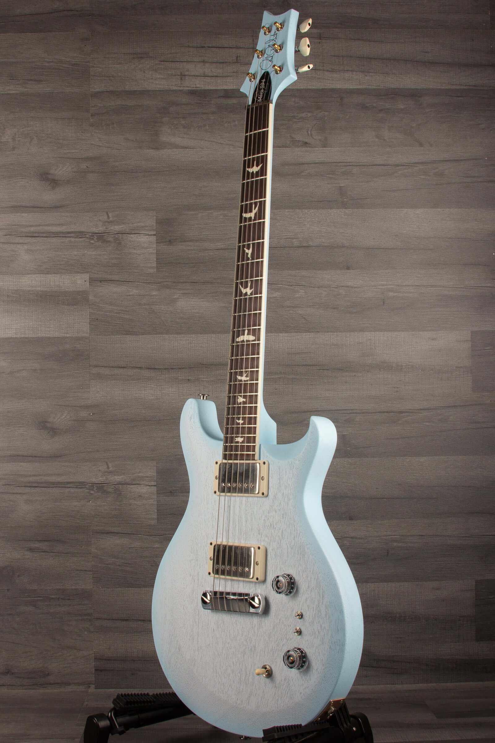 PRS - S2 Mira 594 Satin Cloudburst electric guitar in blue finish on display.