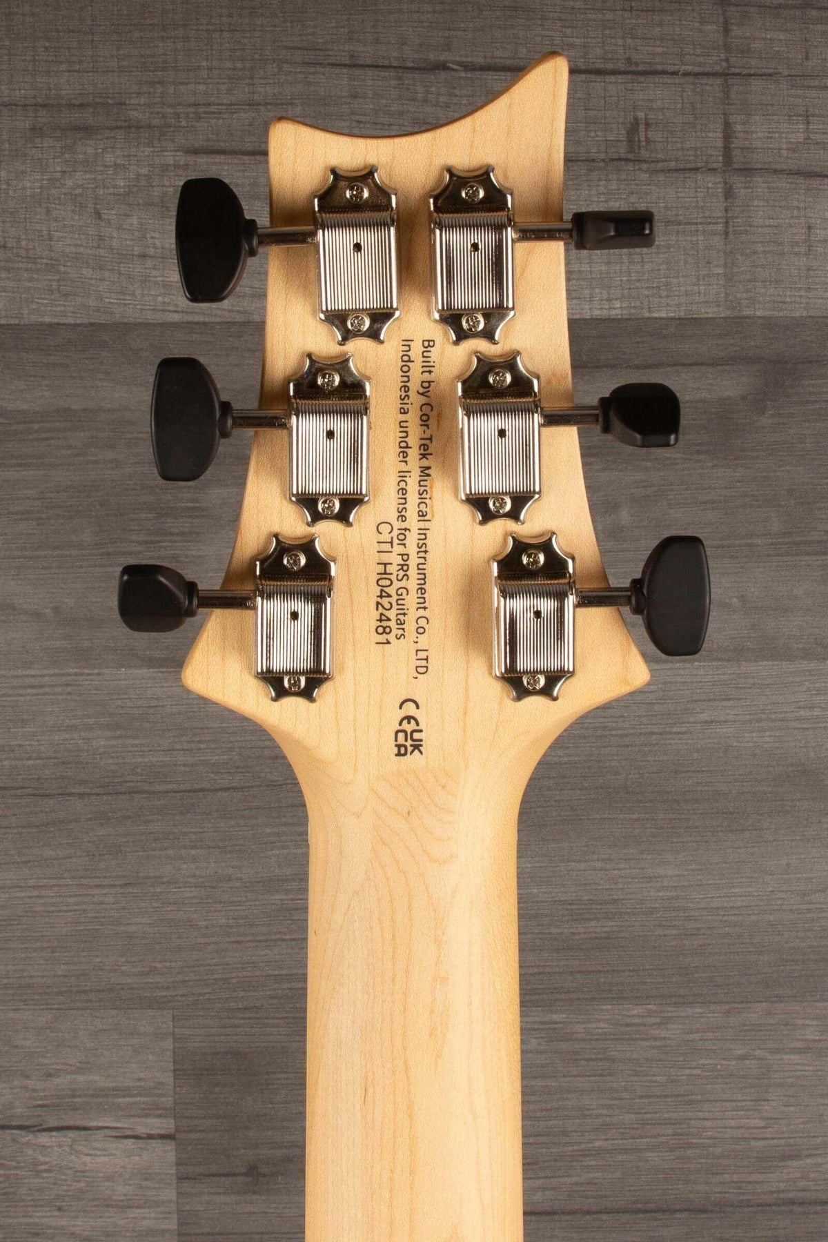 PRS SE NF53 Electric Guitar, Black Doghair Finish headstock with tuning pegs and engraved logo.