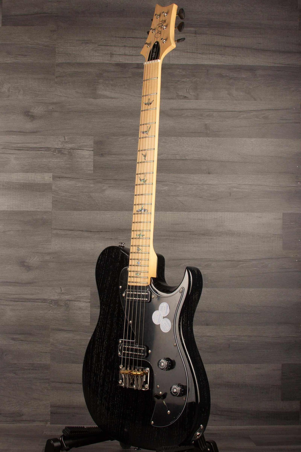 PRS SE NF53 Electric Guitar, Black Doghair Finish displayed against a dark background with natural wood grain.
