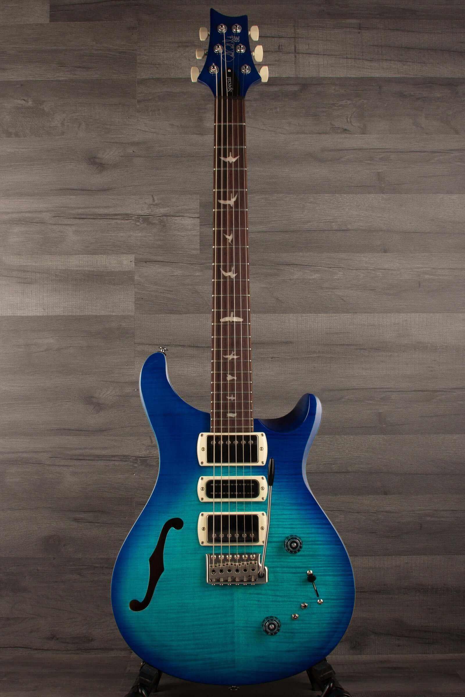 PRS SE Special Semi Hollow - Lake Blue guitar showcasing its semi-hollow design and blue finish.