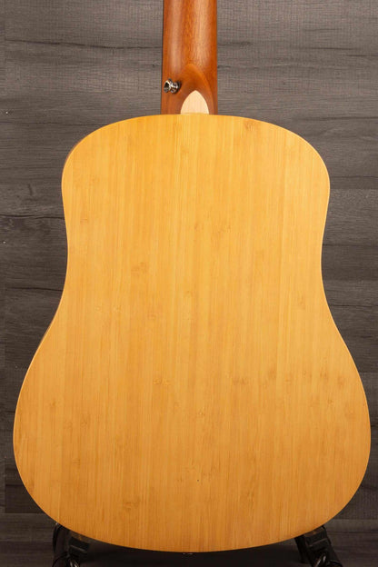 Back view of the Tanglewood TWT18 Tiare Travel Acoustic, Natural Bamboo guitar showcasing its unique bamboo finish.