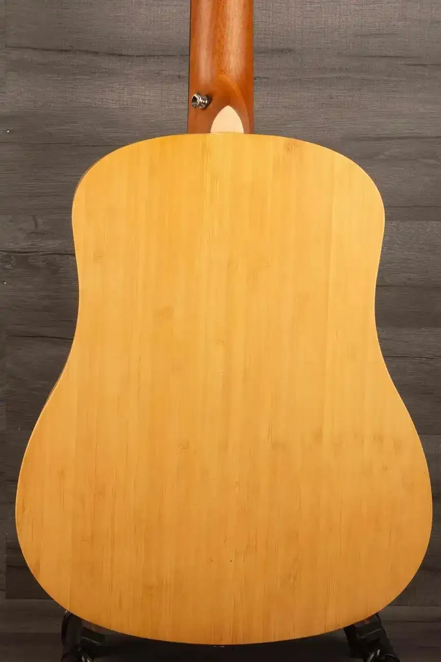 Back view of the Tanglewood TWT18 Tiare Travel Acoustic, Natural Bamboo guitar showcasing its unique bamboo finish.