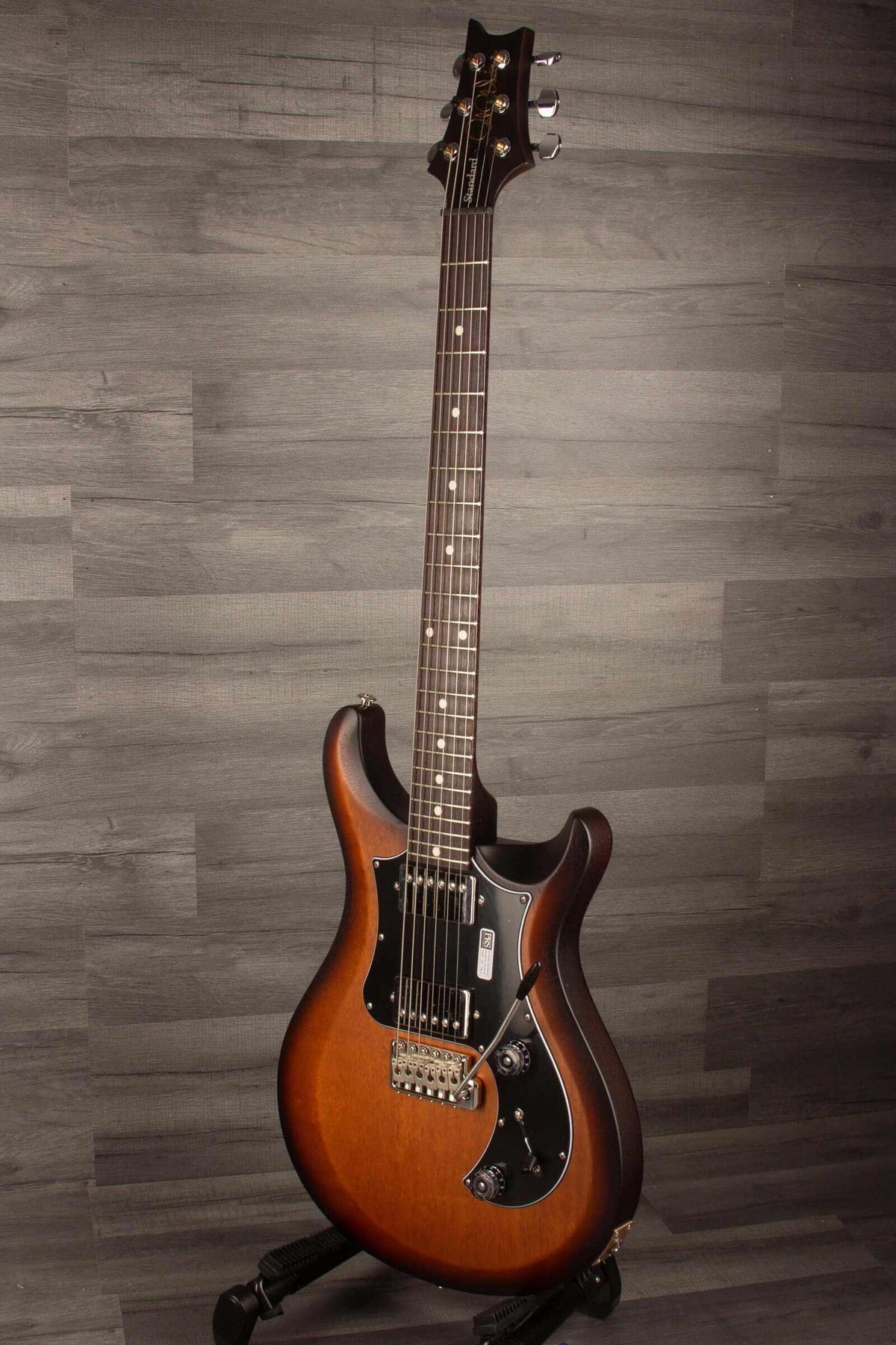 USED - PRS S2 Standard 24 Satin - McCarty tobacco sun burst guitar on display, featuring a mahogany body and neck.