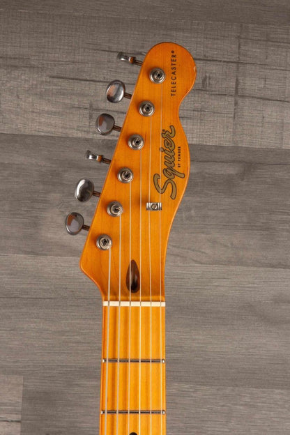 Used Squier 40th Anniversary Telecaster vintage edition headstock, Satin Mocha finish, in good condition.