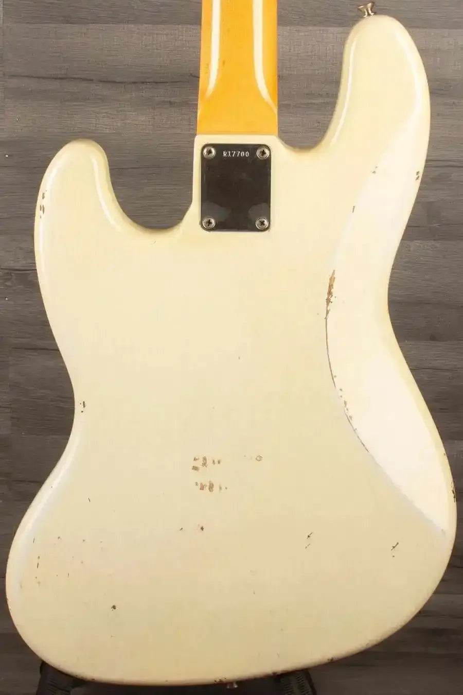 USED Fender Custom shop 64 Jazz Bass back view showing heavy relic finish and wear.