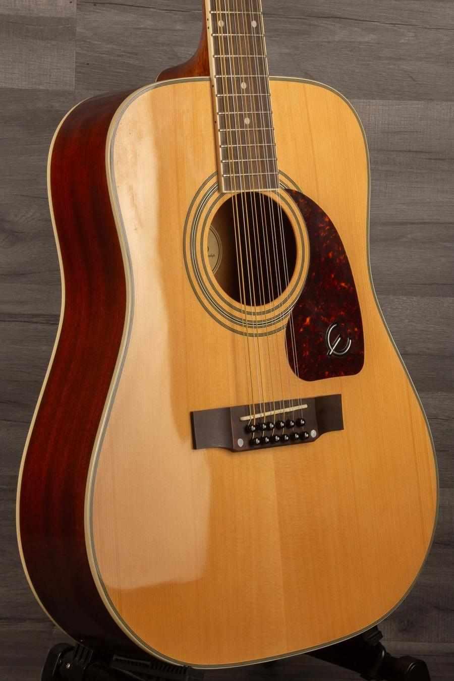 USED Epiphone DR-212 - Natural showcased, featuring spruce top, mahogany sides, and exquisite craftsmanship.