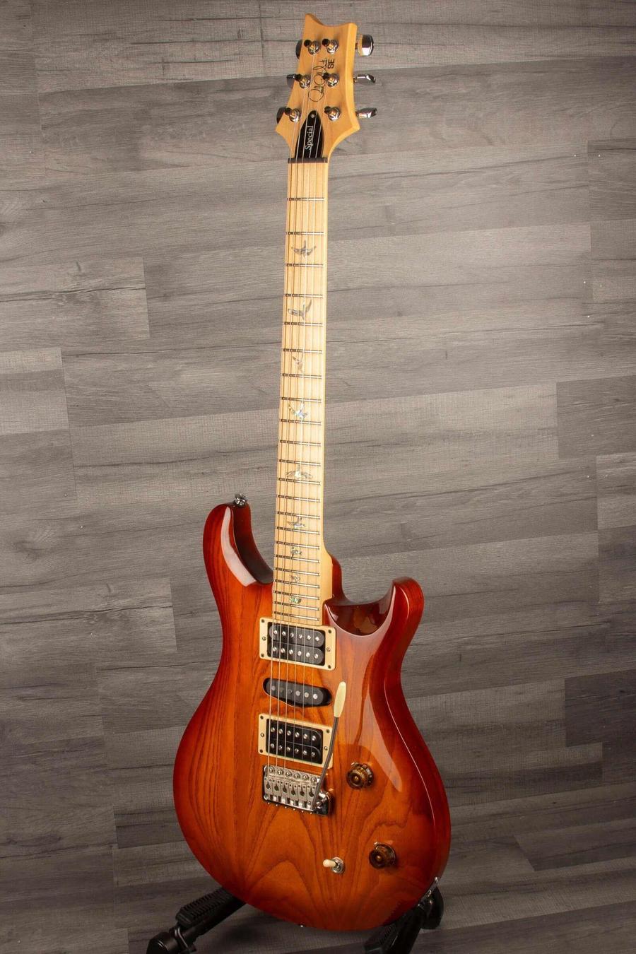 USED - PRS SE - Swamp Ash Special - Vintage Sunburst guitar with maple neck, upgraded locking tuners, and original gig bag.