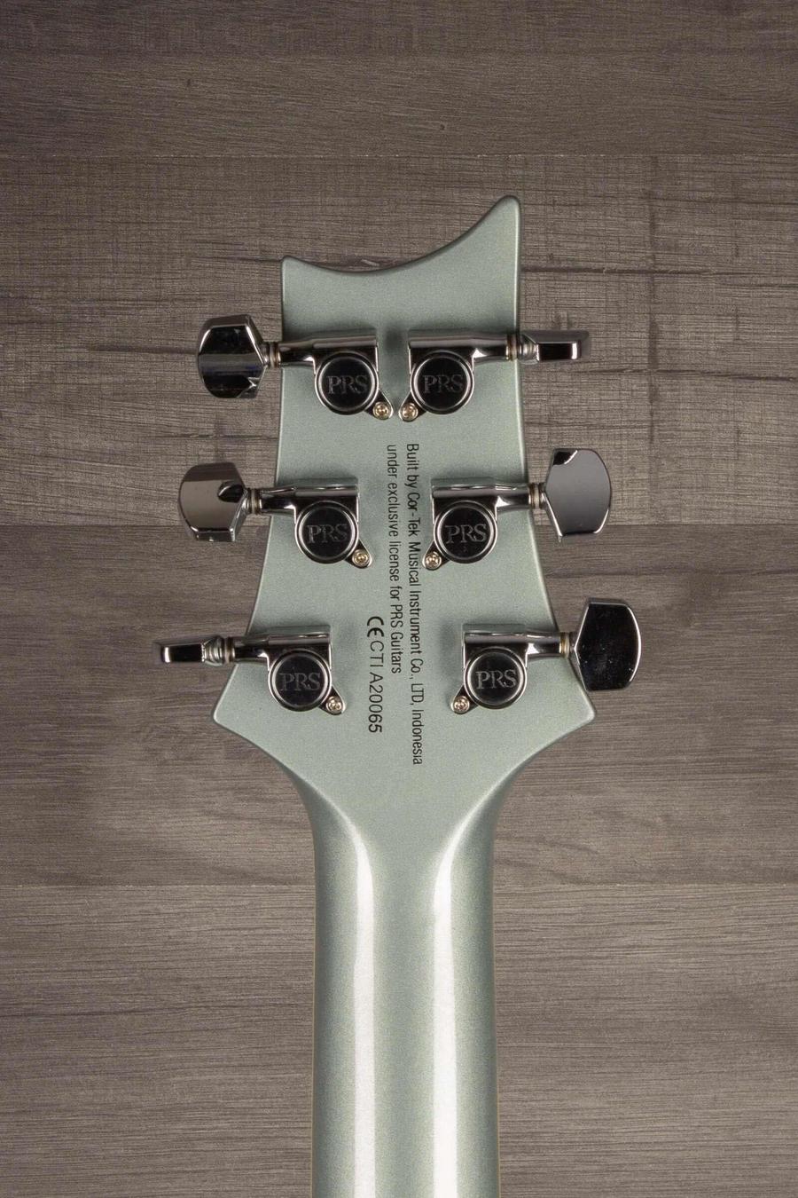 USED - PRS SE Standard 24 Electric Guitar - Bay Bridge Blue headstock view, showcasing tuning pegs and logo.