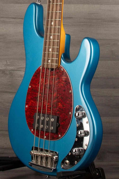 USED - Sterling by Music Man Stingray Ray24 Bass Guitar - Toluca Lake Blue close-up view showcasing body and hardware.