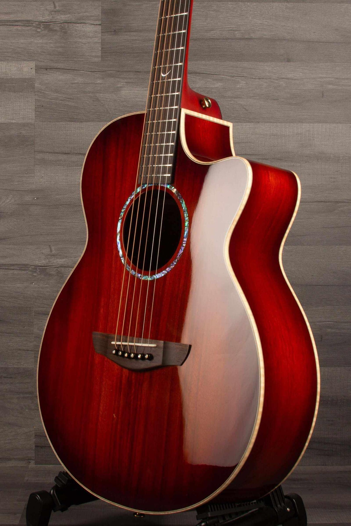 Faith BLOOD MOON Series Venus CE Inc Case guitar with glossy finish and unique shape.