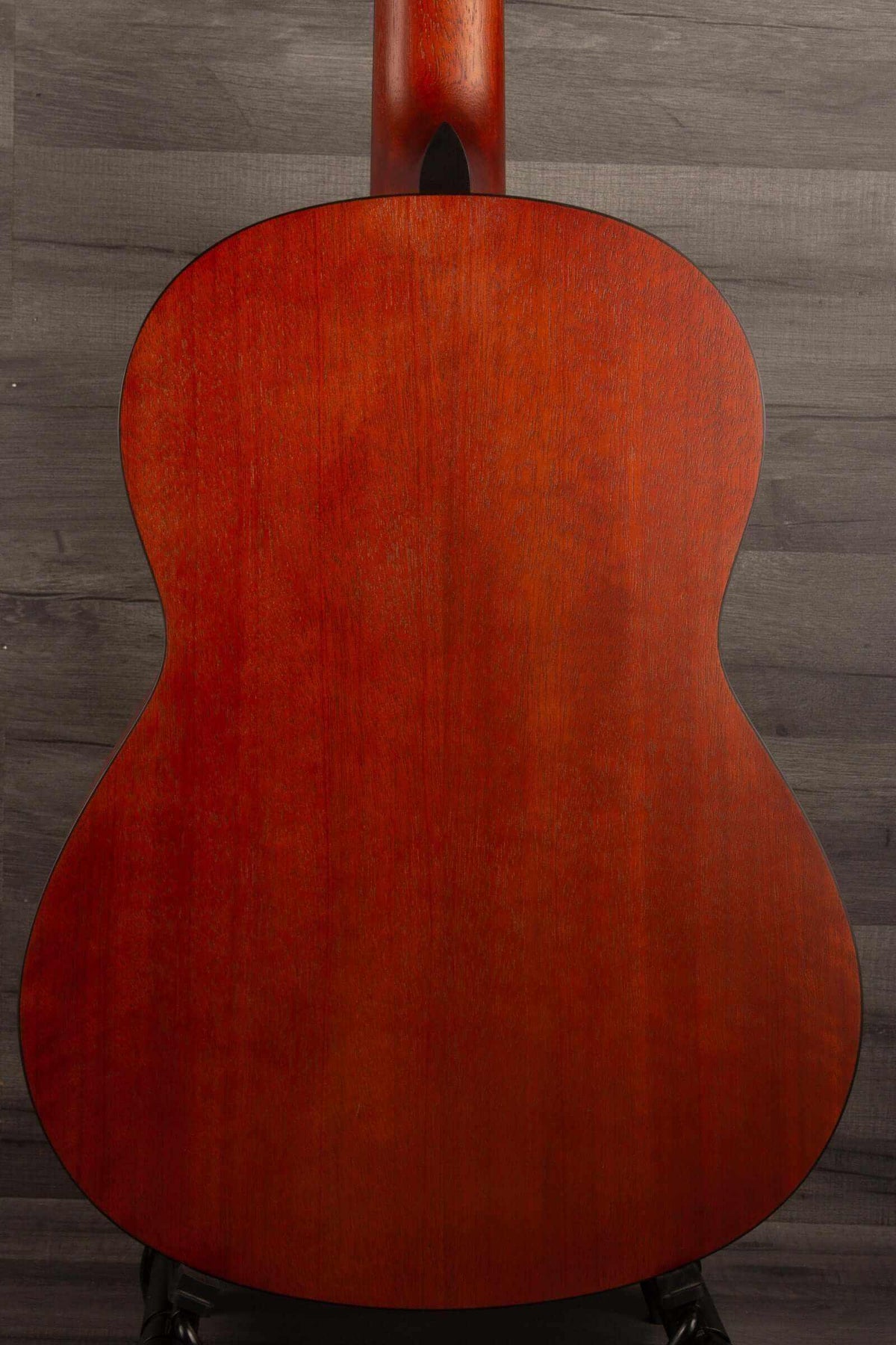 Back view of Yamaha CG122MS affordable classical guitar showcasing its beautiful wood finish.
