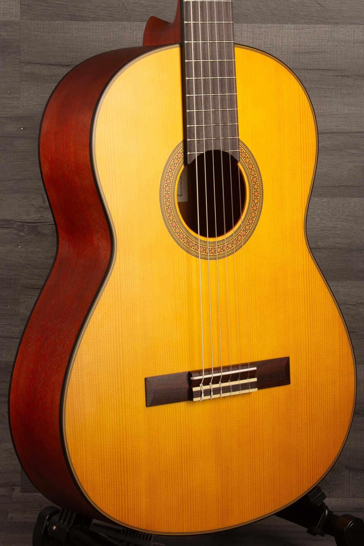 Yamaha CG122MS classical guitar showcasing its beautiful design and affordable classical guitar features.