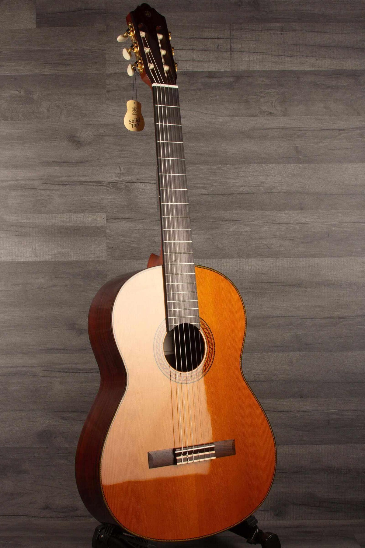 Yamaha CG192C classical guitar with a beautiful finish, offering exceptional sound response and playability.