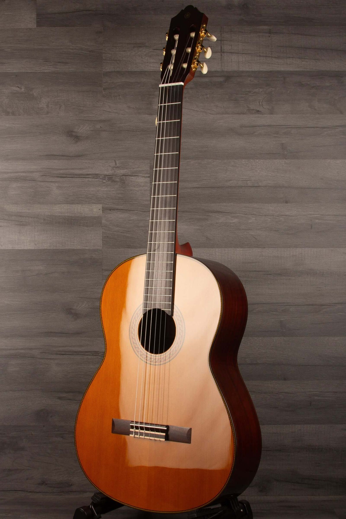 Yamaha CG192C classical guitar with a smooth finish and elegant design for enhanced sound quality.