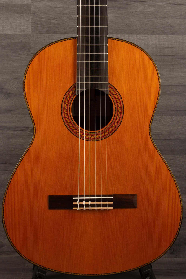 Yamaha CG192C classical guitar with a rich wood finish and classic design for exceptional sound quality and durability.