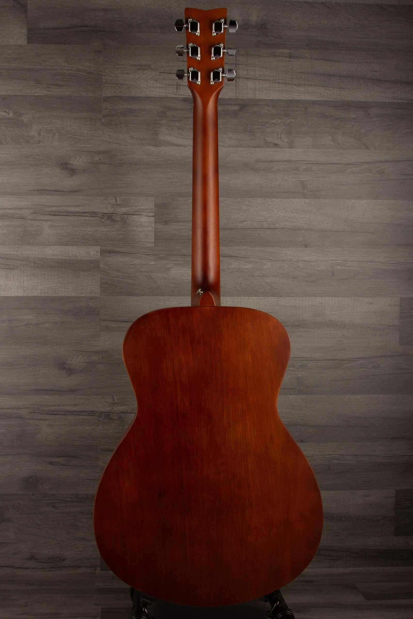 Back view of Yamaha FS400 Natural Satin acoustic guitar showcasing its smooth finish and concert body design.