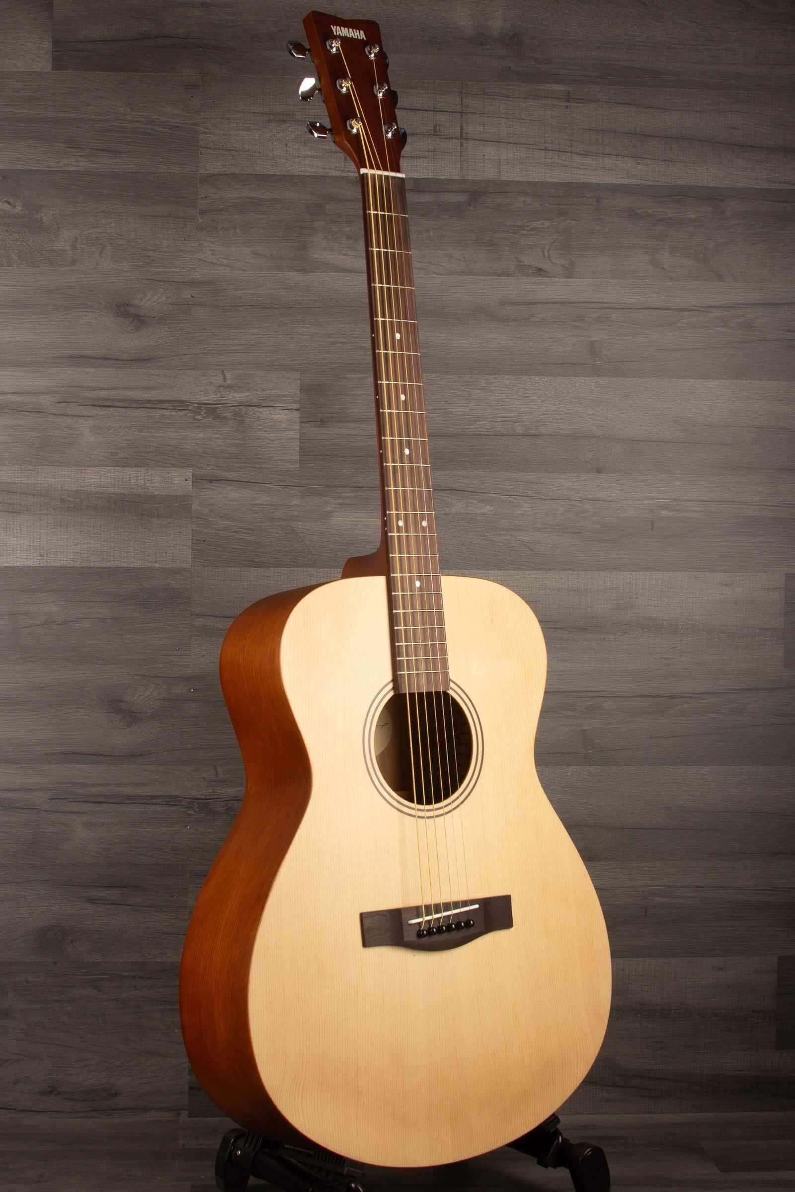 Yamaha FS400 Natural Satin acoustic guitar showcasing its compact concert body and natural finish.