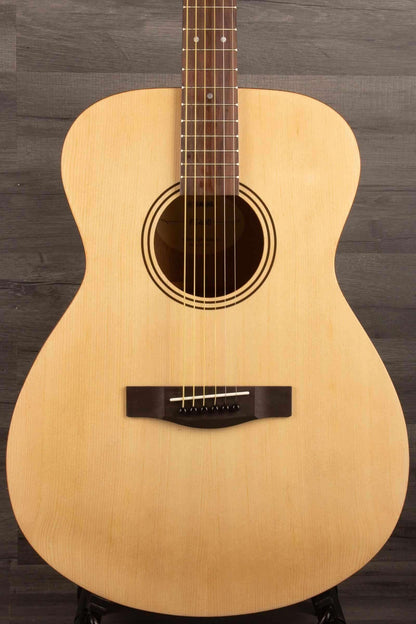 Yamaha FS400 Natural Satin acoustic guitar front view on a wooden surface