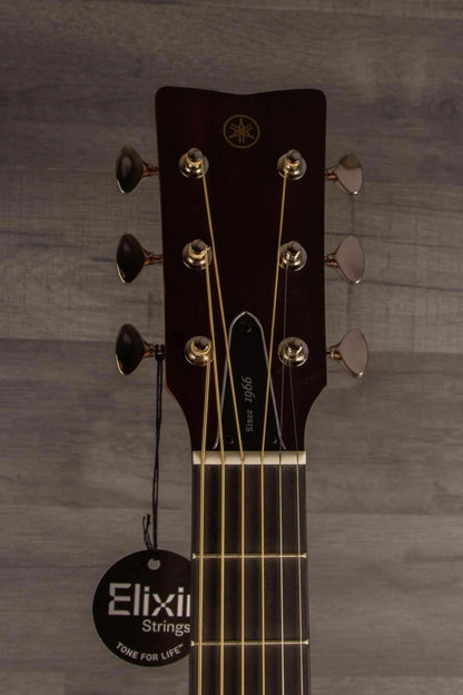 Yamaha FG5G - Acoustic Guitar headstock with Elixir Strings tag and tuning pegs