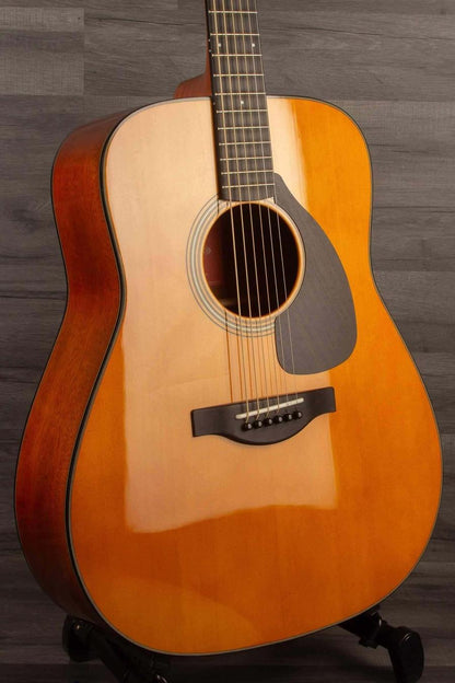 Yamaha FG5G - Acoustic Guitar showcasing its sleek design and quality craftsmanship.