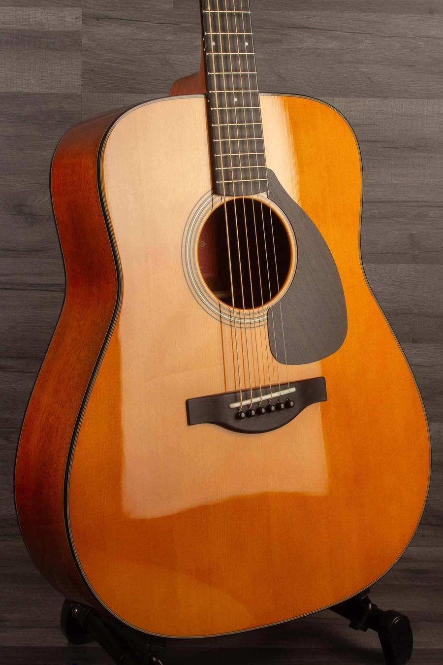 Yamaha FG5G - Acoustic Guitar showcasing its sleek design and quality craftsmanship.