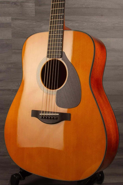 Yamaha FG5G - Acoustic Guitar showcasing African mahogany body and solid sitka spruce top.