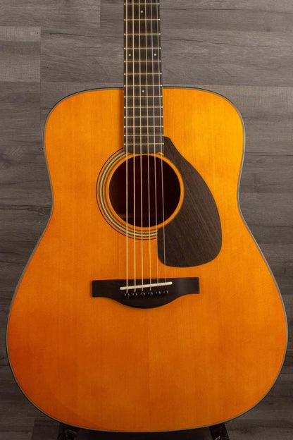 Yamaha FG5G - Acoustic Guitar, showcasing a solid spruce top and African mahogany body, perfect for rich melodies.