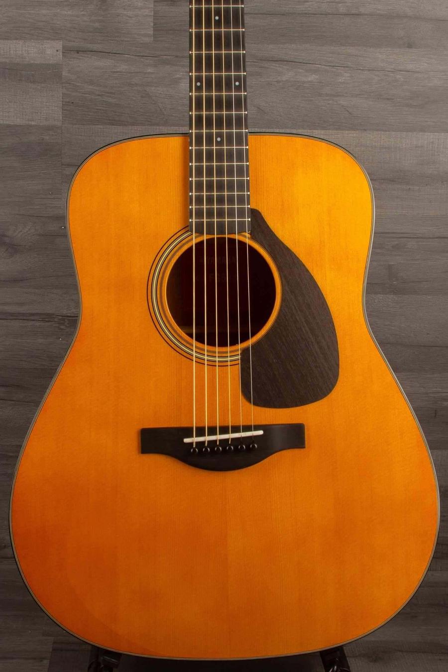 Yamaha FG5G - Acoustic Guitar, showcasing a solid spruce top and African mahogany body, perfect for rich melodies.