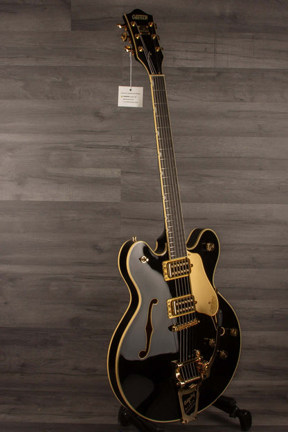 Gretsch Broadkaster® LX Center Block guitar in black with gold hardware and ebony fingerboard, showcasing modern design and features.